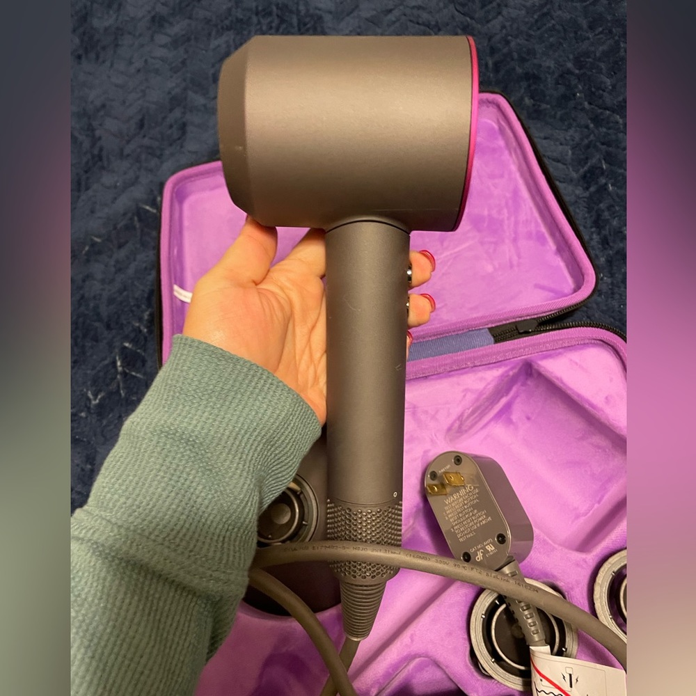 Lightly used dyson hairdryer with attachments